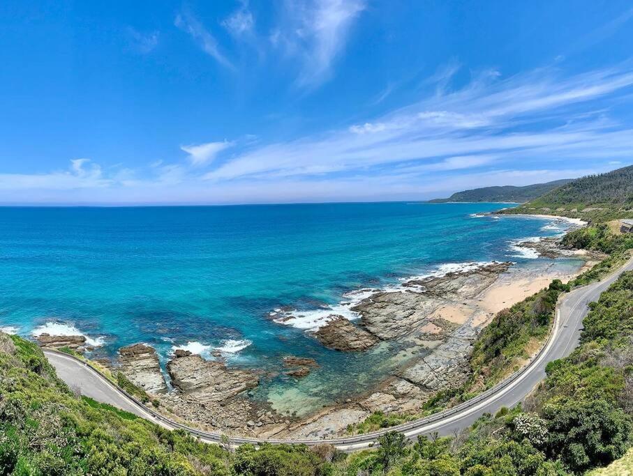 an aerial view of the ocean and a road at Glassy Point - 360 degree views in Wye River