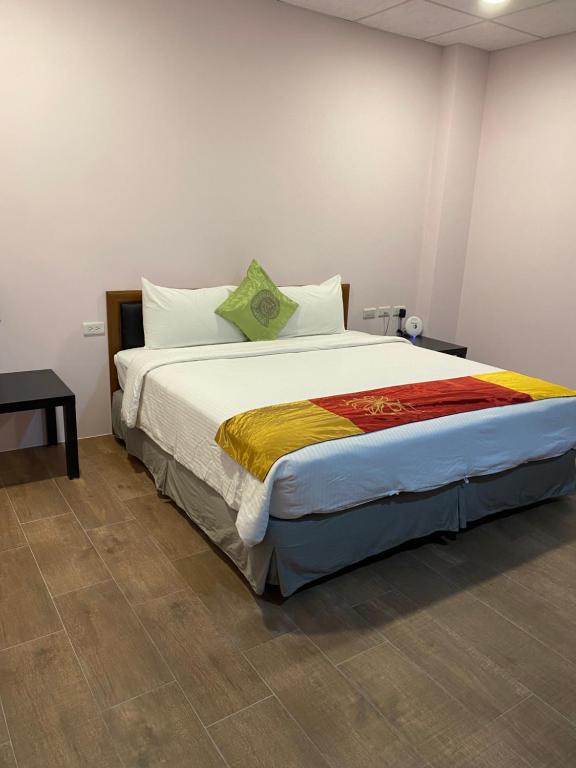 Postel nebo postele na pokoji v ubytování 恆玖民宿 Heng Jiou Homestay