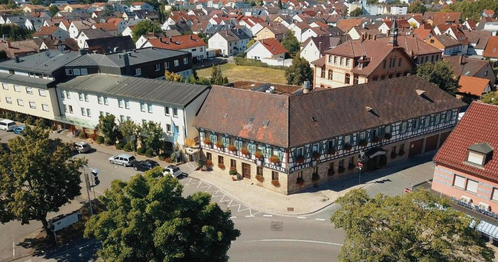 an overhead view of a city with buildings and a street at Hotel Adler Asperg in Asperg