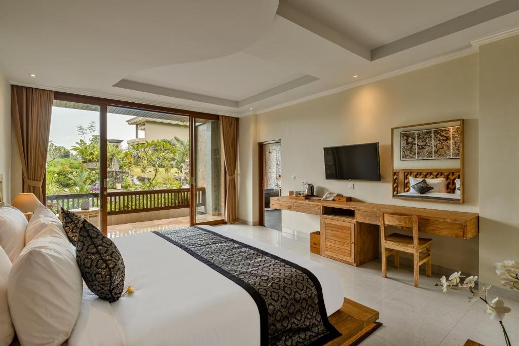 TV a/nebo společenská místnost v ubytování Gynandha Ubud Cottage