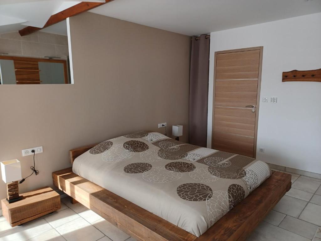Posteľ alebo postele v izbe v ubytovaní La Grange 3 étoiles - Maison d'hôte à 10 min des plages