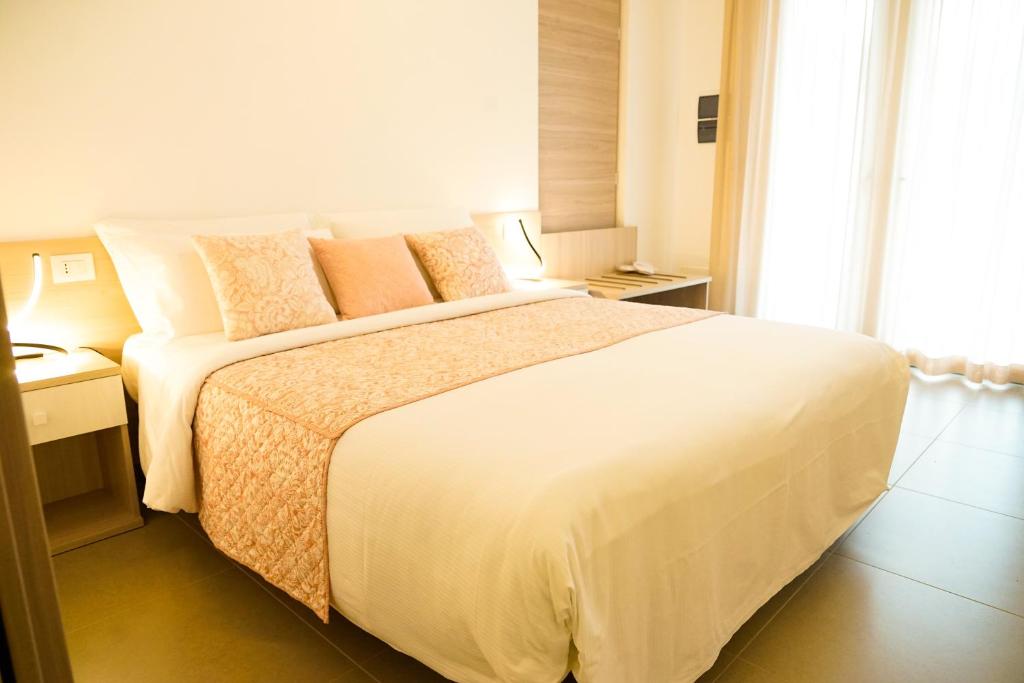 A bed or beds in a room at Agriturismo La dimora dei Re