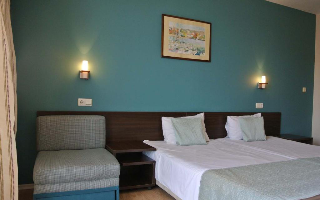 Postel nebo postele na pokoji v ubytování Valeo Hotel