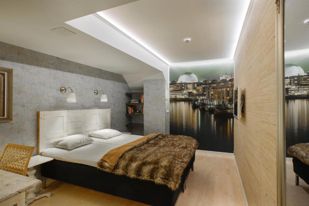 Postel nebo postele na pokoji v ubytování Skanstulls Boutique Hostel