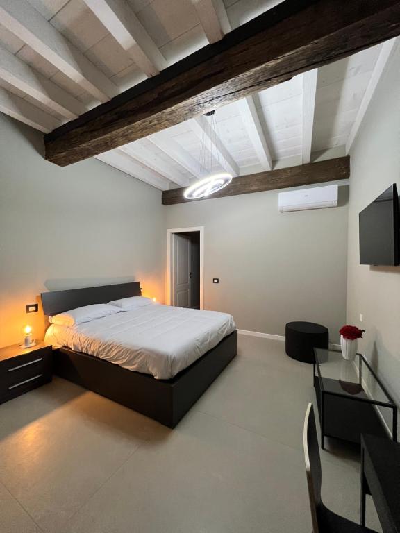 Postel nebo postele na pokoji v ubytování V&B Suites and Apartments