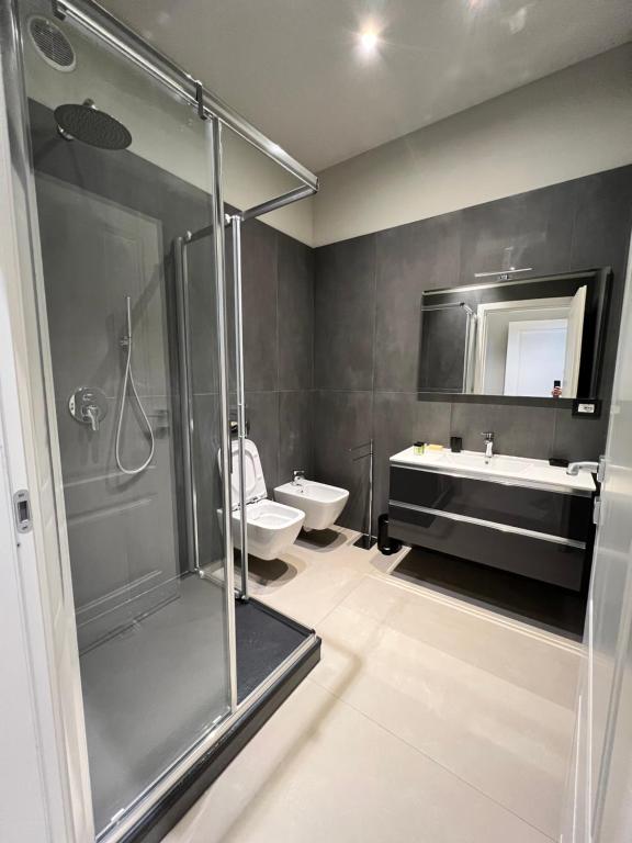 Koupelna v ubytování V&B Suites and Apartments