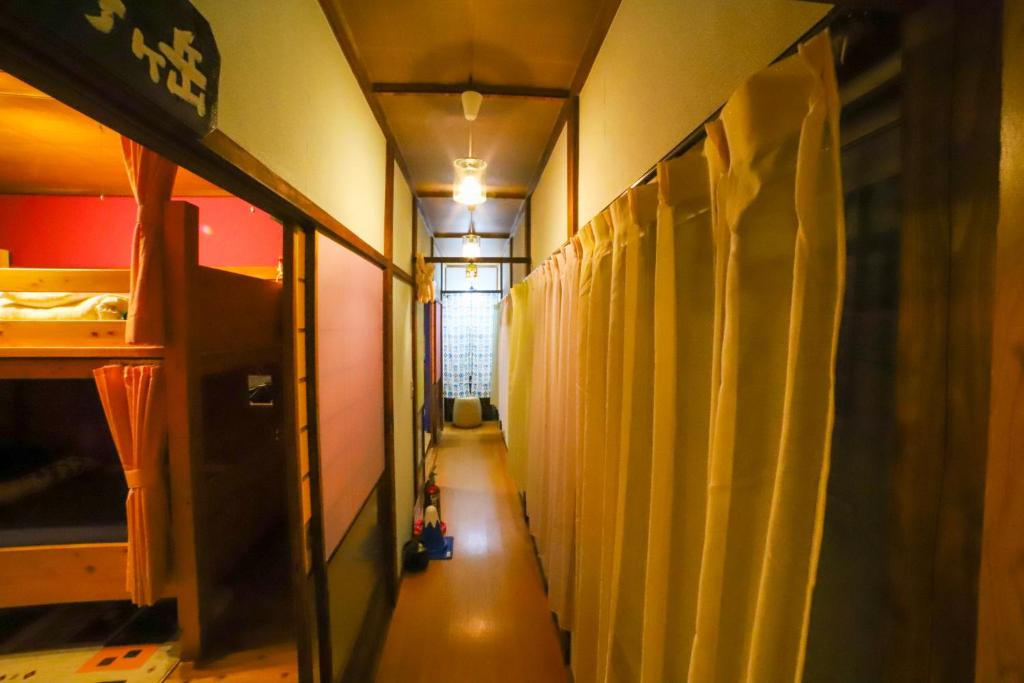 Palanda nebo palandy na pokoji v ubytování Guest House Tokiwa