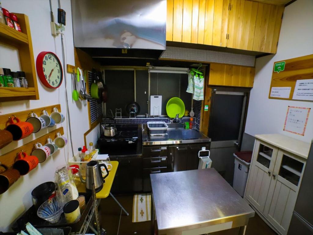 Kuchyň nebo kuchyňský kout v ubytování Guest House Tokiwa