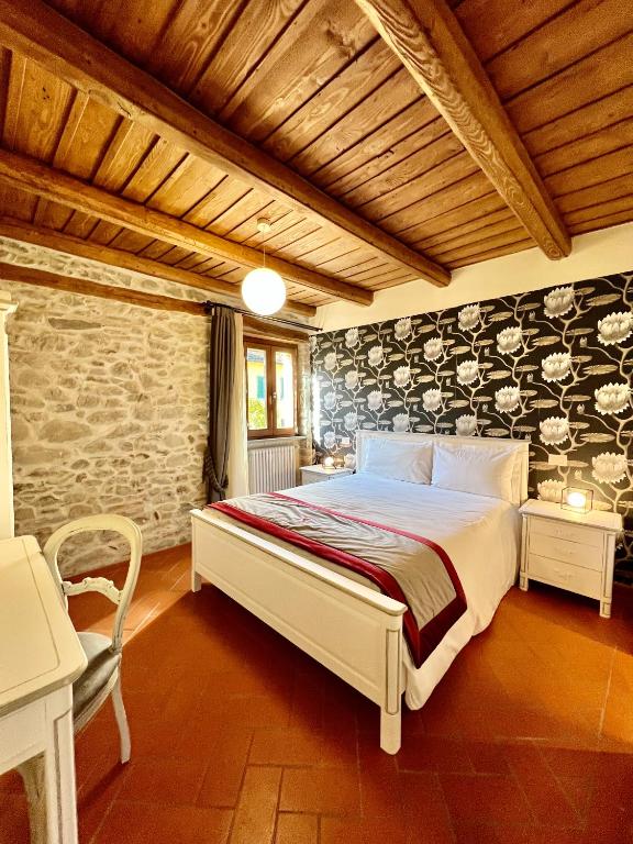 Postel nebo postele na pokoji v ubytování Nobilia Dimore - Suite & Spa®