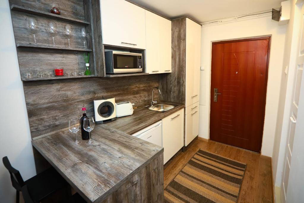 Kuchnia lub aneks kuchenny w obiekcie Mamma Mia Apartmanok
