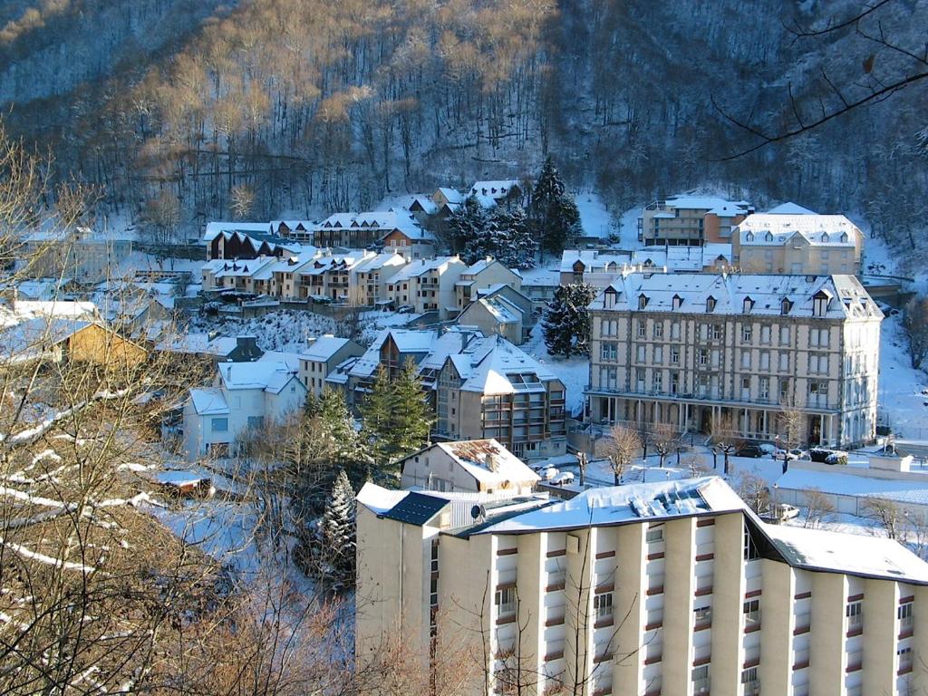 a town covered in snow with a building at Boost Your Immo Barèges Artigalas PM55 in Barèges