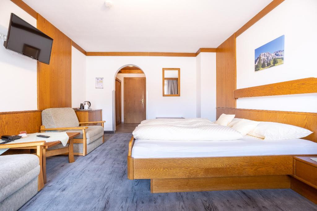 Postel nebo postele na pokoji v ubytování Gästehaus Wilhelmshof