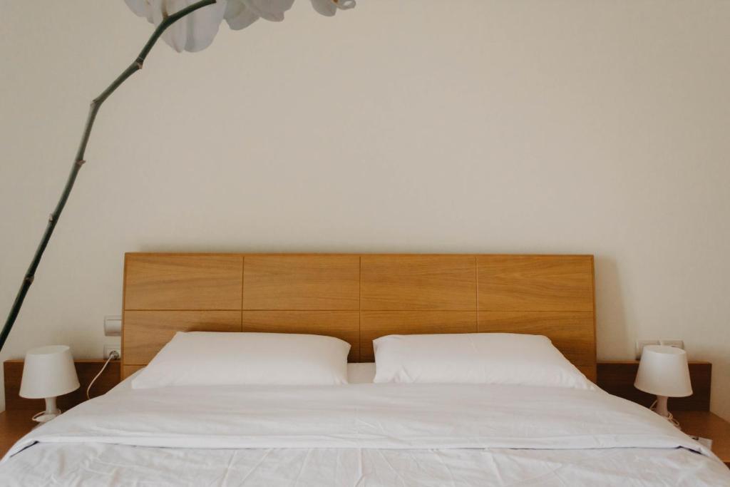 Postel nebo postele na pokoji v ubytování DimSim Home-Σπίτι με όνομα