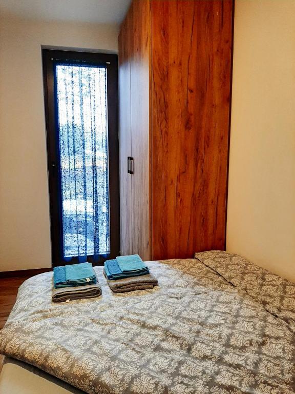 Postel nebo postele na pokoji v ubytování Pahulja