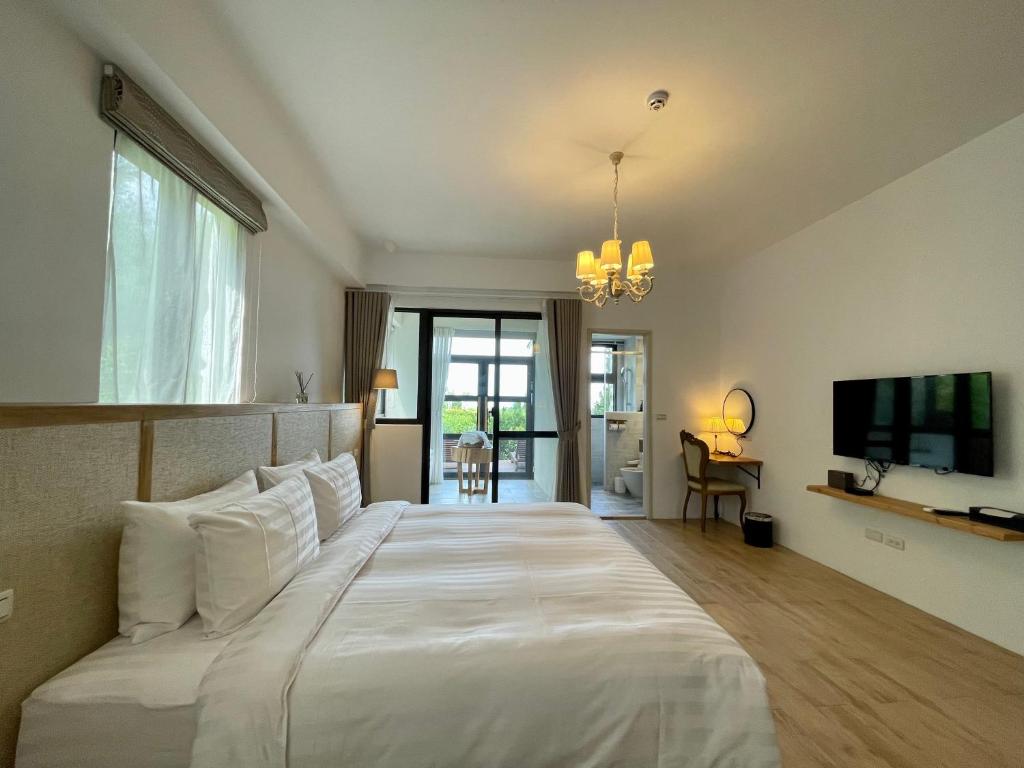 Giường trong phòng chung tại 台東 奧麗雅安莊園 Chateau de olea
