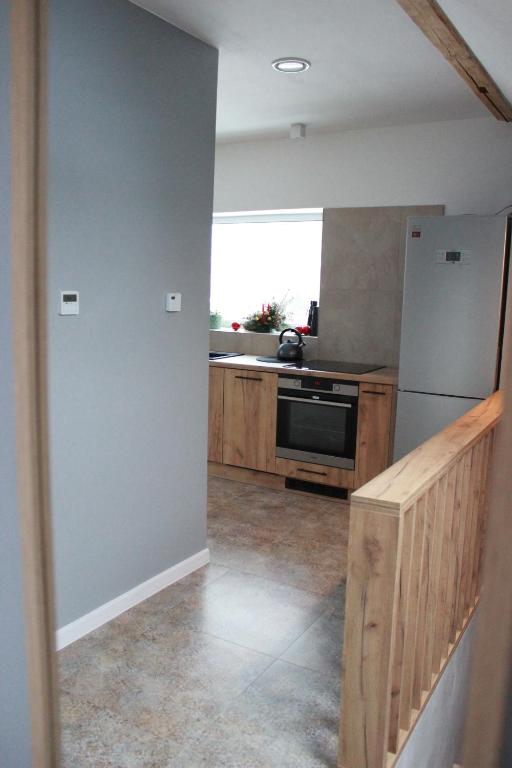 Kuchyňa alebo kuchynka v ubytovaní Apartament Nad Góralem