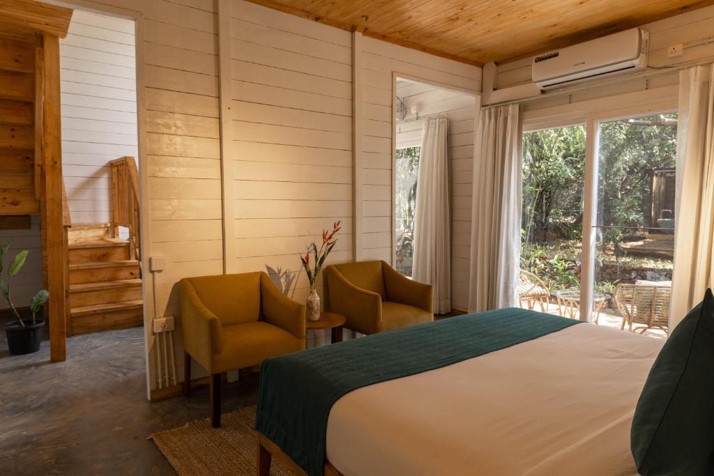 Postel nebo postele na pokoji v ubytování Larisa Resort Ashwem