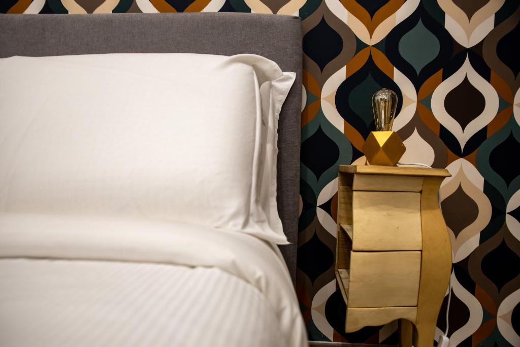 Posteľ alebo postele v izbe v ubytovaní Geometric Art Home