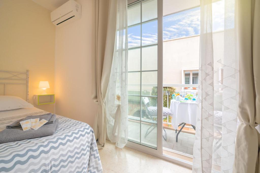 Ένα ή περισσότερα κρεβάτια σε δωμάτιο στο B&B Dei Musicisti