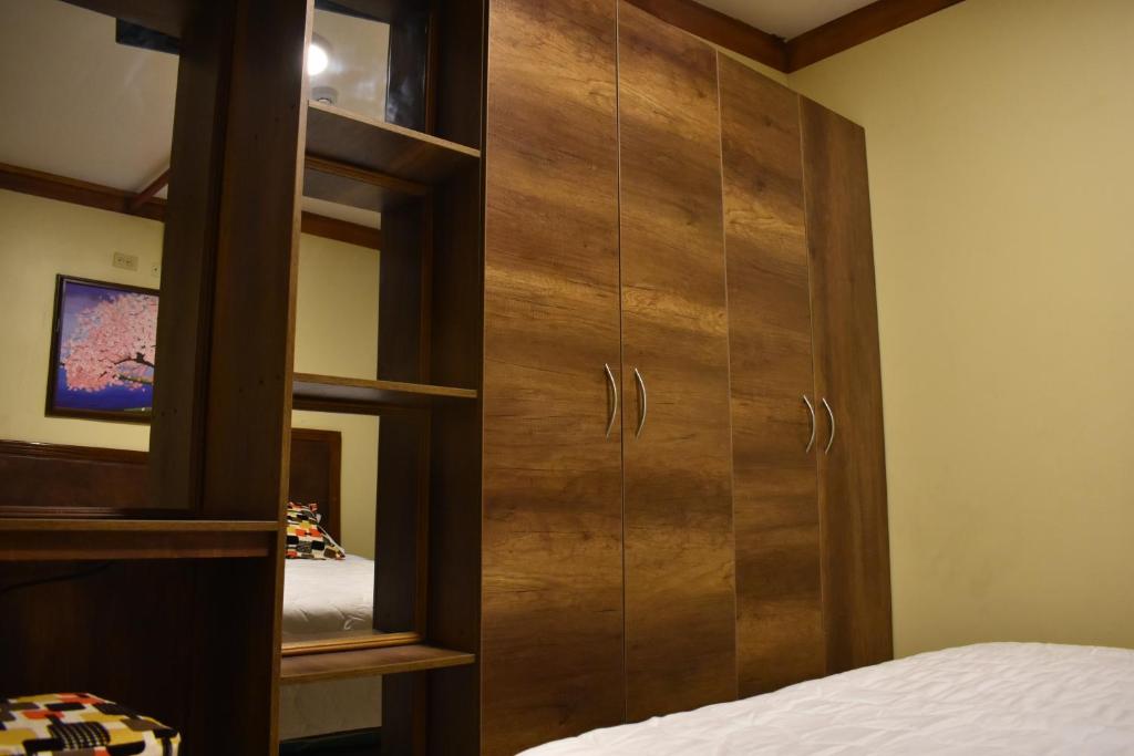 Postel nebo postele na pokoji v ubytování Hotel Bonanza