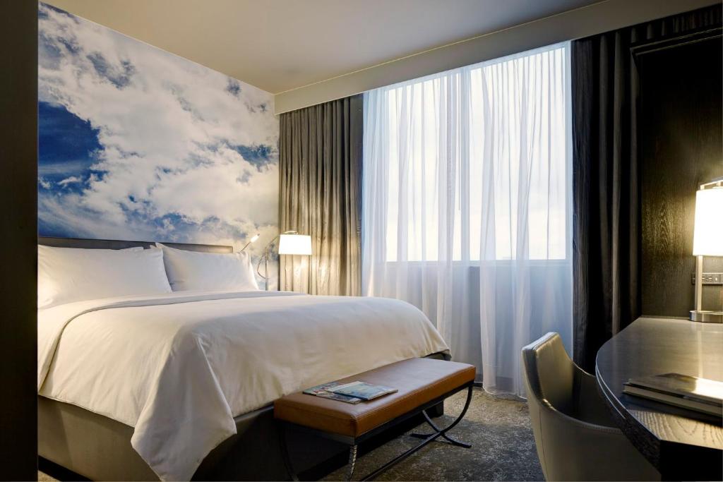Postel nebo postele na pokoji v ubytování Archer Hotel Austin