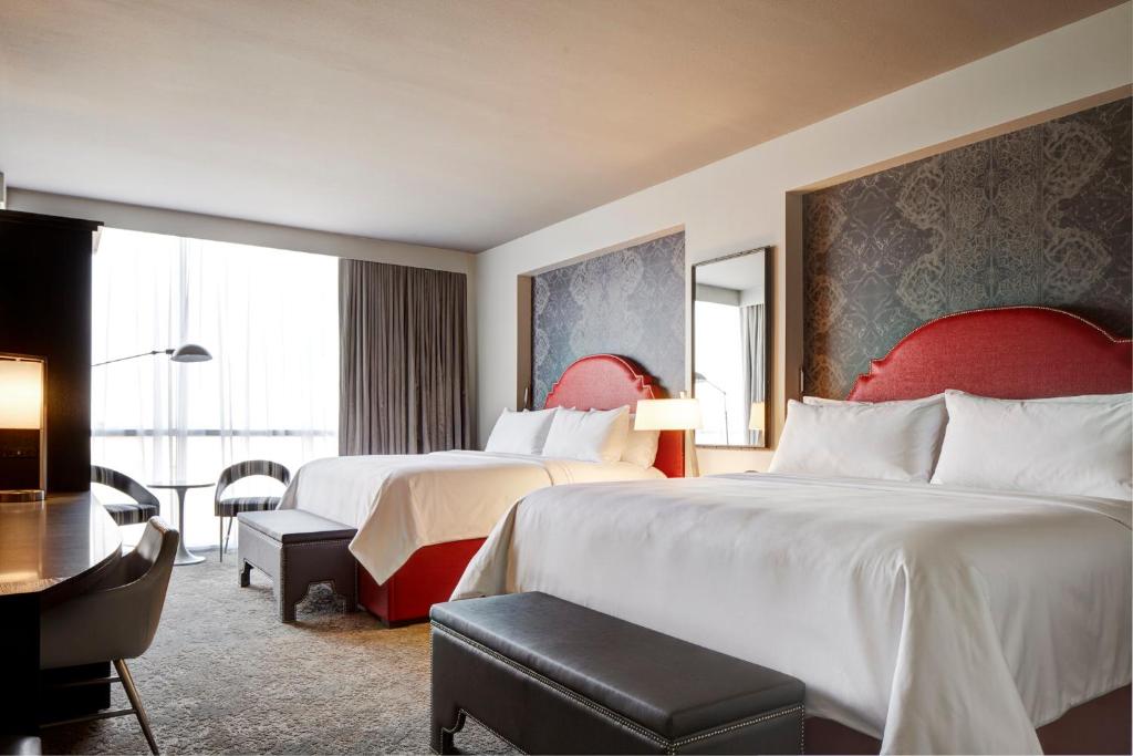 Postel nebo postele na pokoji v ubytování Archer Hotel Austin