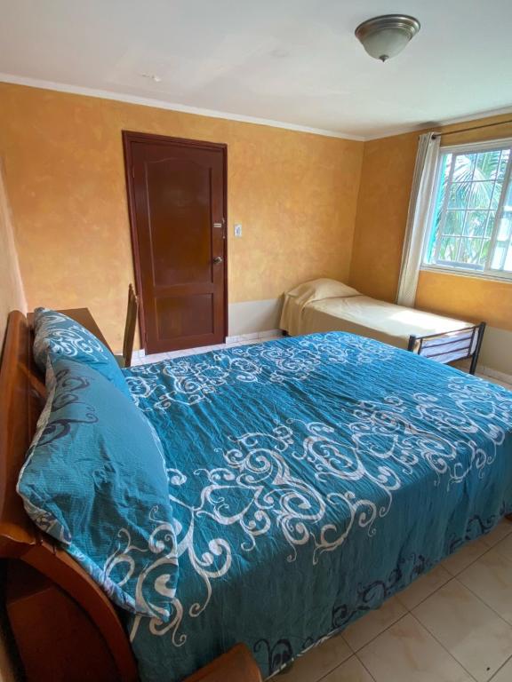 Postel nebo postele na pokoji v ubytování Canal Inn Panama