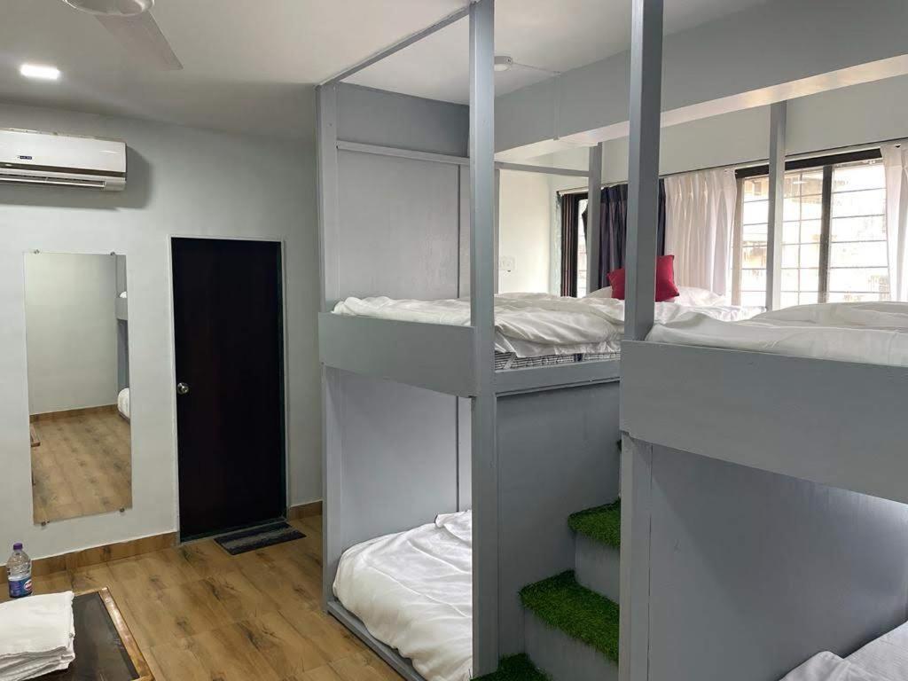Postel nebo postele na pokoji v ubytování Bliss Rooms