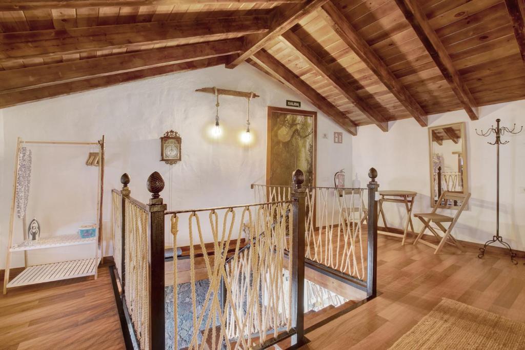 Postel nebo postele na pokoji v ubytování Casa Tía Eulalia