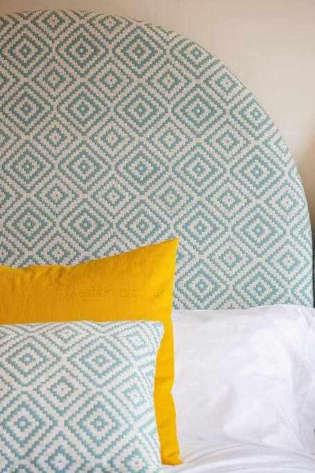 A bed or beds in a room at Silmo Ático By Silastur