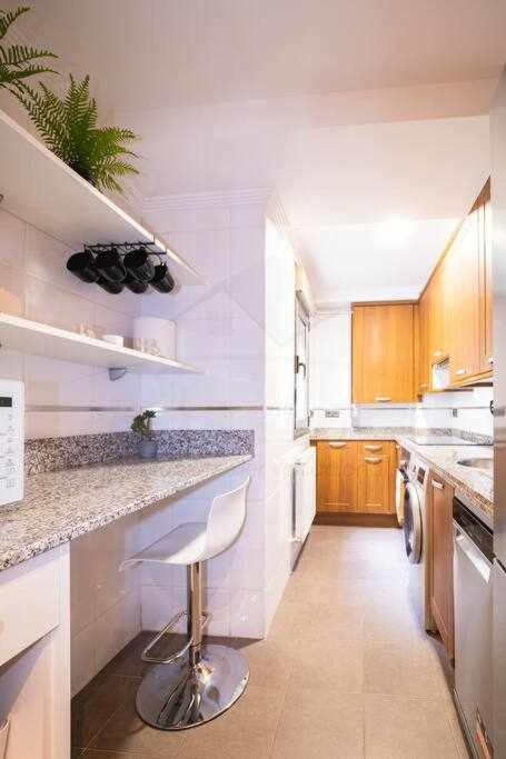 A kitchen or kitchenette at Silmo Ático By Silastur