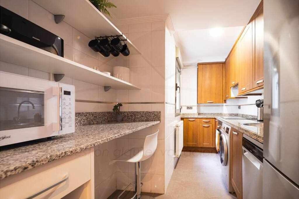 A kitchen or kitchenette at Silmo Ático By Silastur