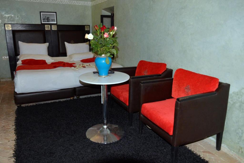 Postel nebo postele na pokoji v ubytování Riad Dar La Rose