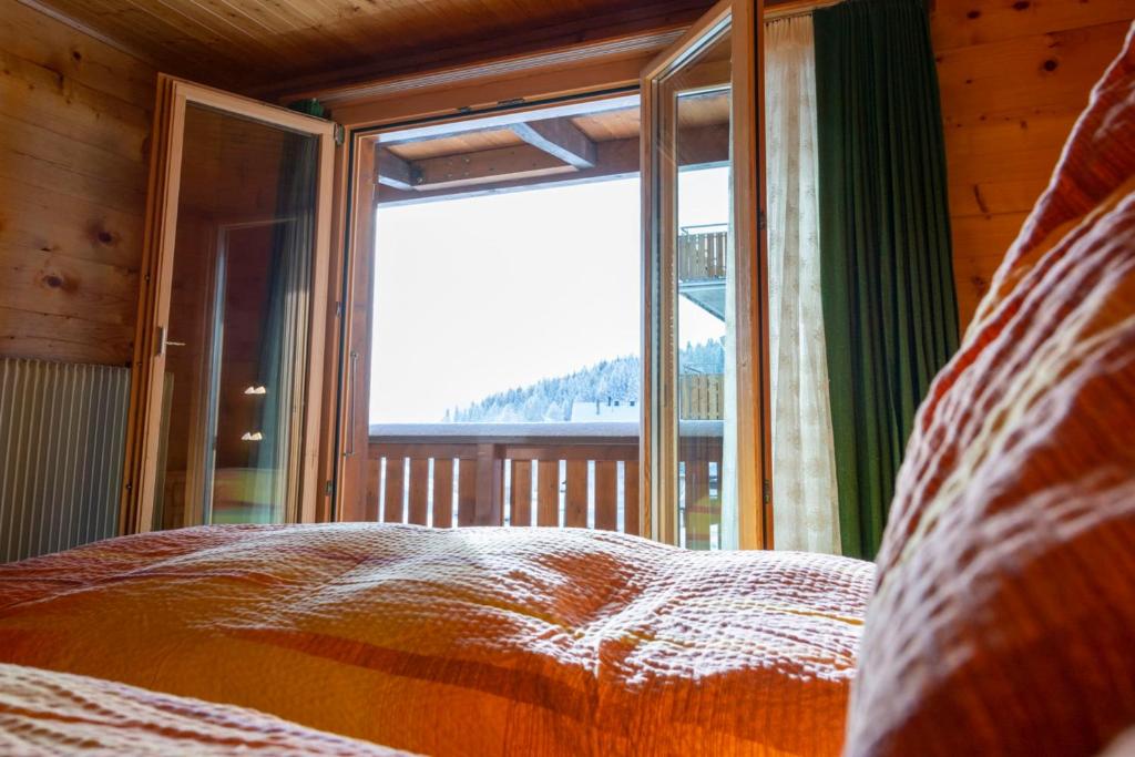 Postel nebo postele na pokoji v ubytování Chalet Weisshorn 2