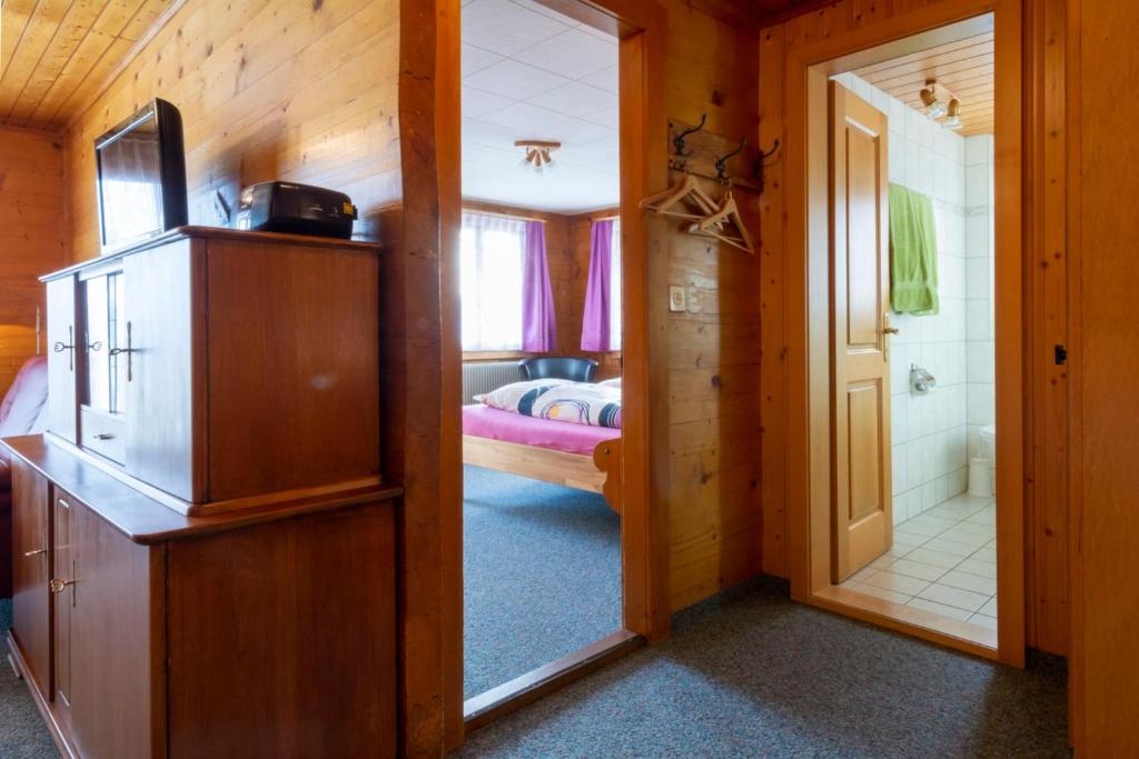 Postel nebo postele na pokoji v ubytování Chalet Weisshorn 2