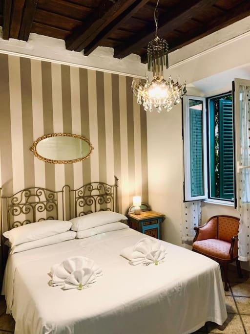 Llit o llits en una habitació de Lidia-heart of Rome,Trastevere