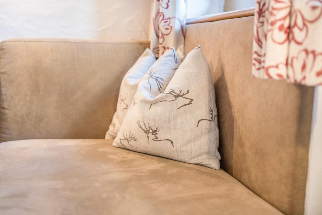 Postel nebo postele na pokoji v ubytování Haus zur Vogelweide App 6