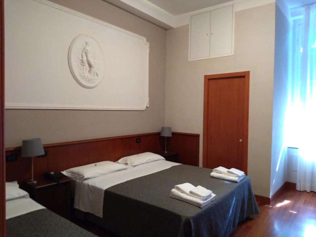 Postel nebo postele na pokoji v ubytování Hotel Twenty Nine