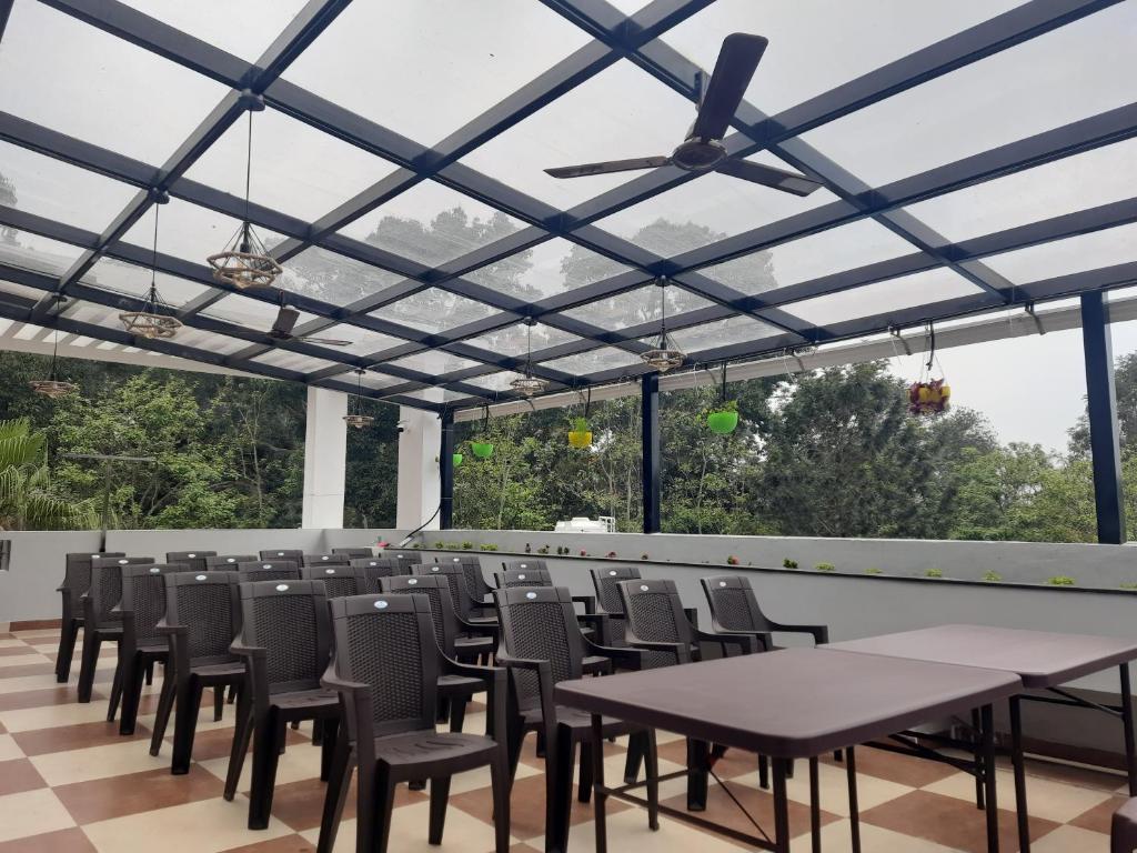 Restaurace v ubytování Melody Inn Luxury Home Stay