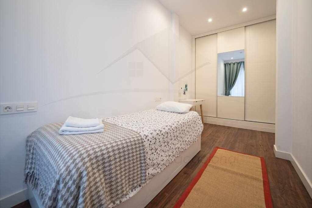 Postel nebo postele na pokoji v ubytování Lavaderu Apartamento