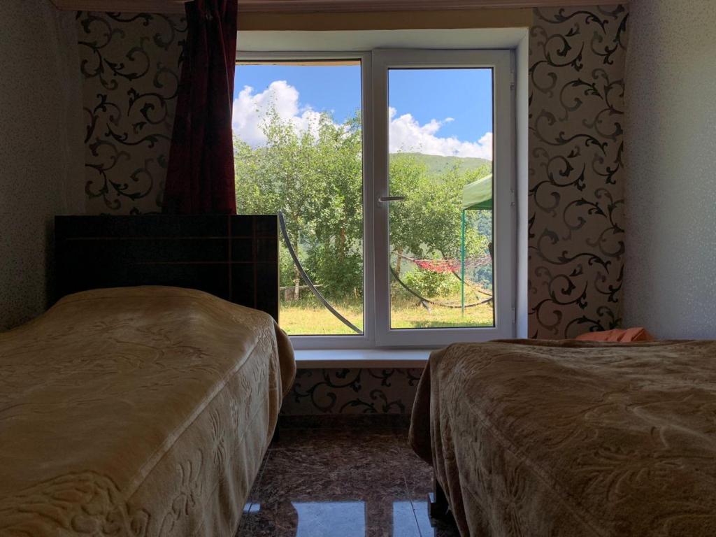 Postel nebo postele na pokoji v ubytování Ardoti Guest House