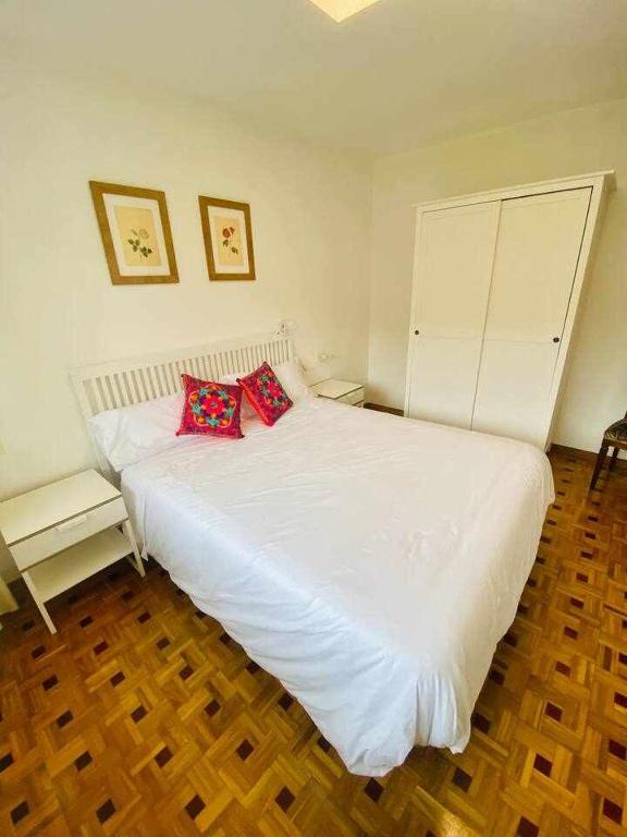 Postel nebo postele na pokoji v ubytování La FayonaRelax y desconexión al lado de Gijon
