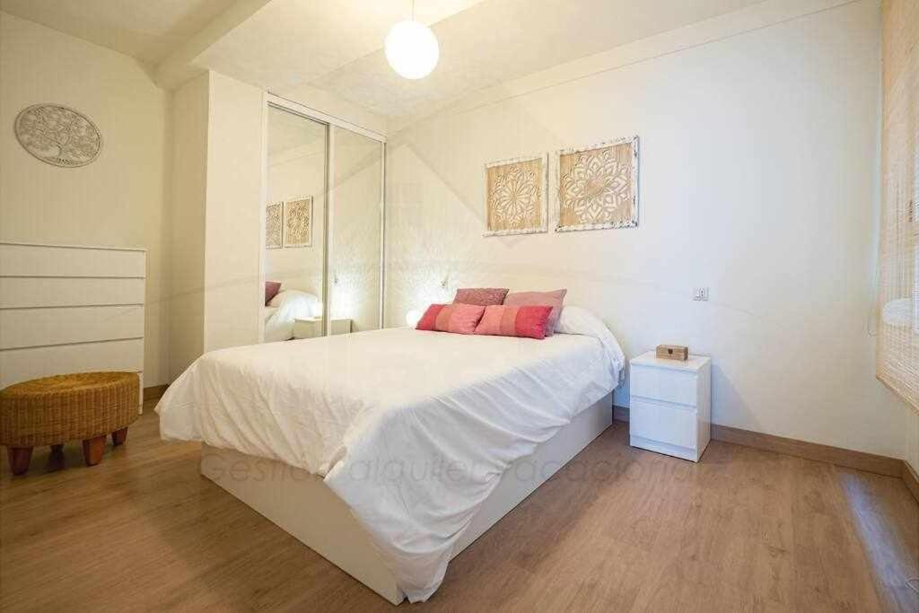 A bed or beds in a room at Monte Aurora