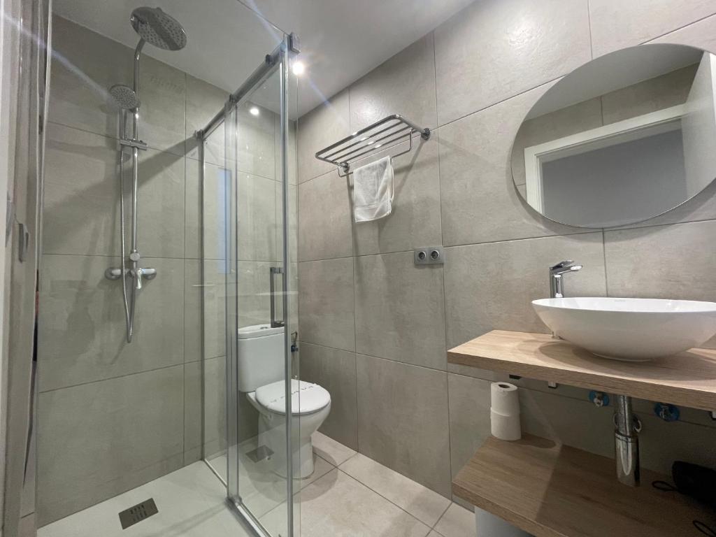 Ванная комната в Apartaments Voramar Roses