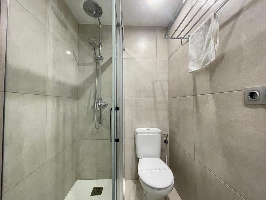 Ванная комната в Apartaments Voramar Roses