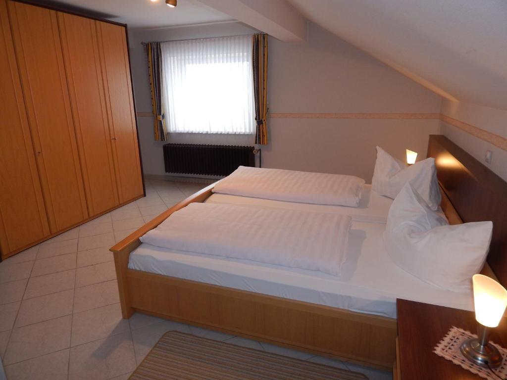 Postel nebo postele na pokoji v ubytování Hotel Jägersruh