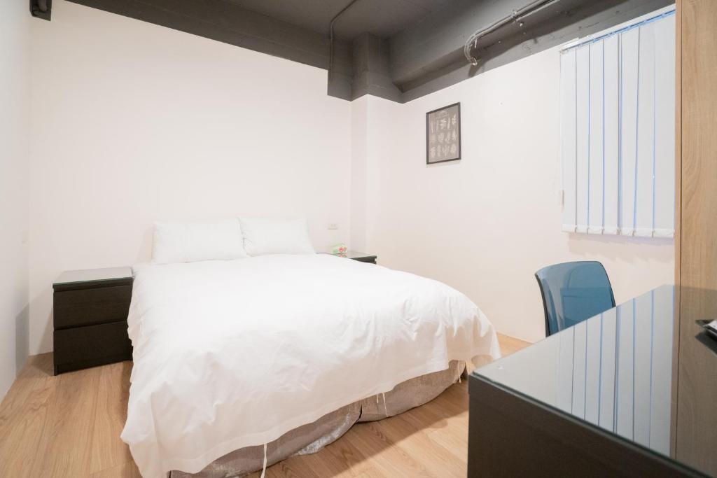 Postel nebo postele na pokoji v ubytování HotelsHere - Ximen