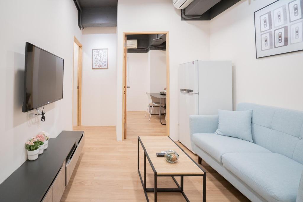 TV a/nebo společenská místnost v ubytování HotelsHere - Ximen