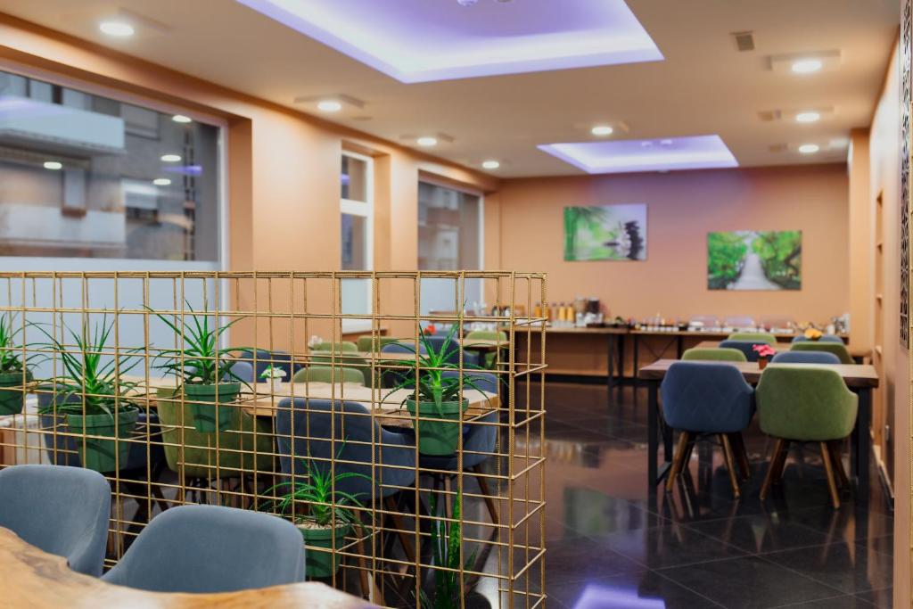 Ein Restaurant oder anderes Speiselokal in der Unterkunft Hotel Castle Rastatt 