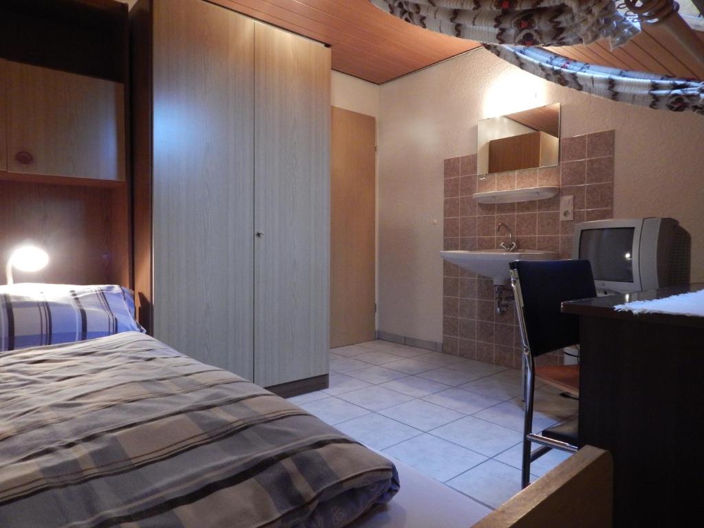 Postel nebo postele na pokoji v ubytování Hotel Jägersruh